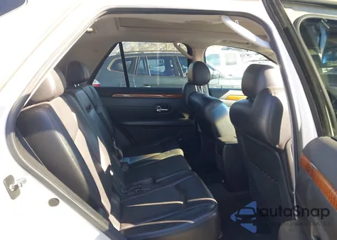 2009 Cadillac Srx V6 z USA, uszkodzony, nr VIN 1GYEE637390113015